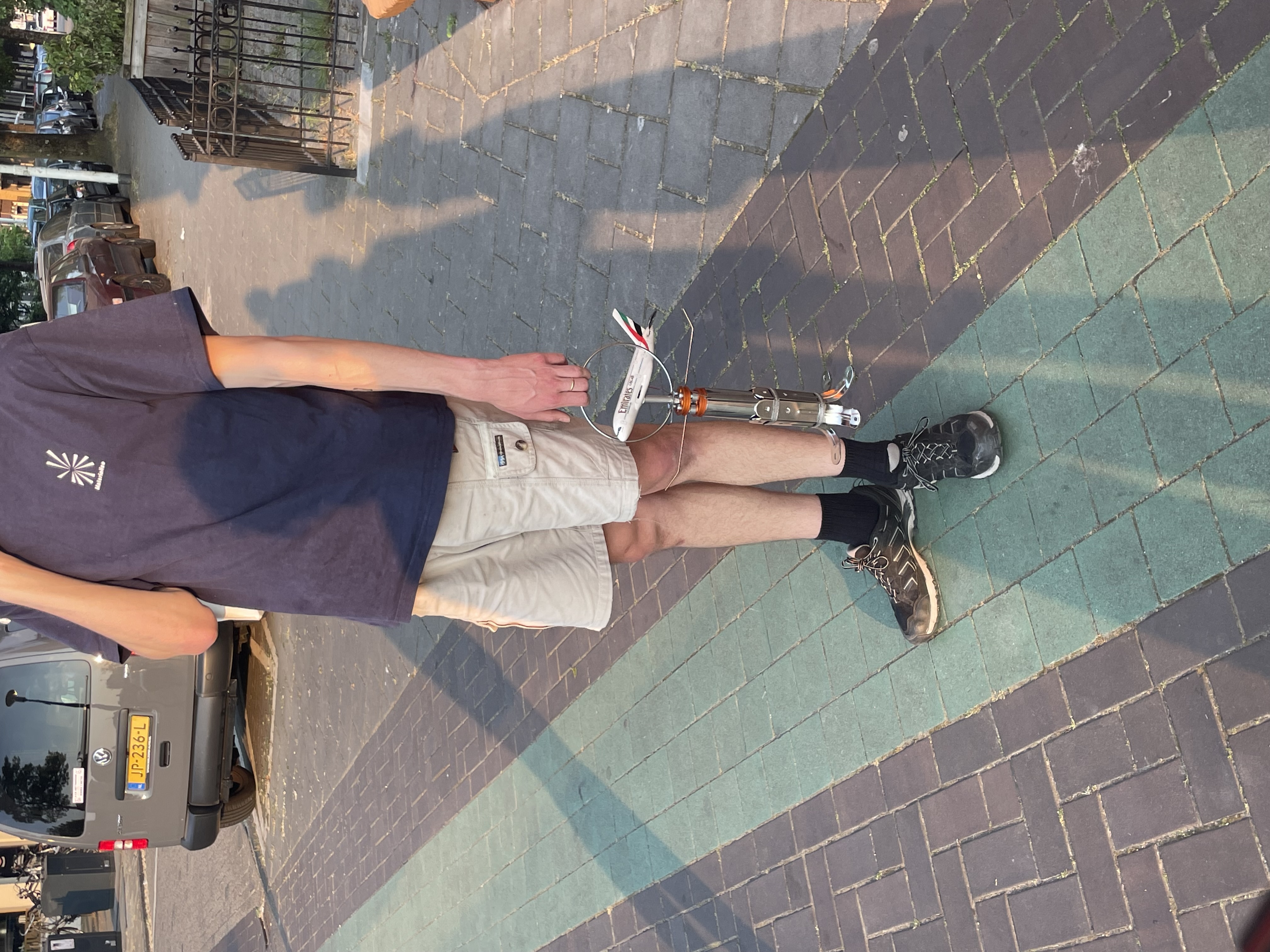 a cutlery set hanger hanged in a person hand