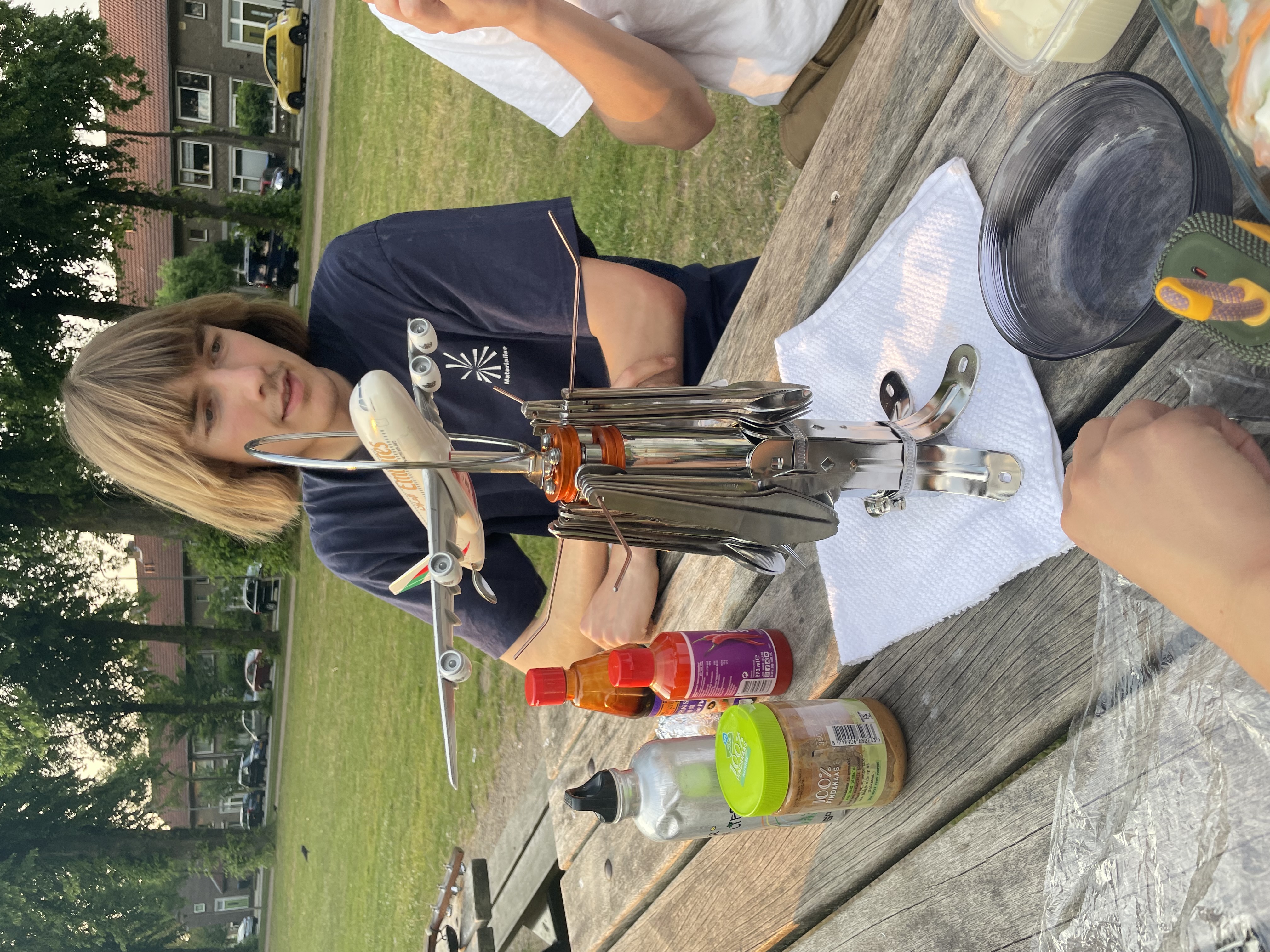 a cutlery set standing on a table