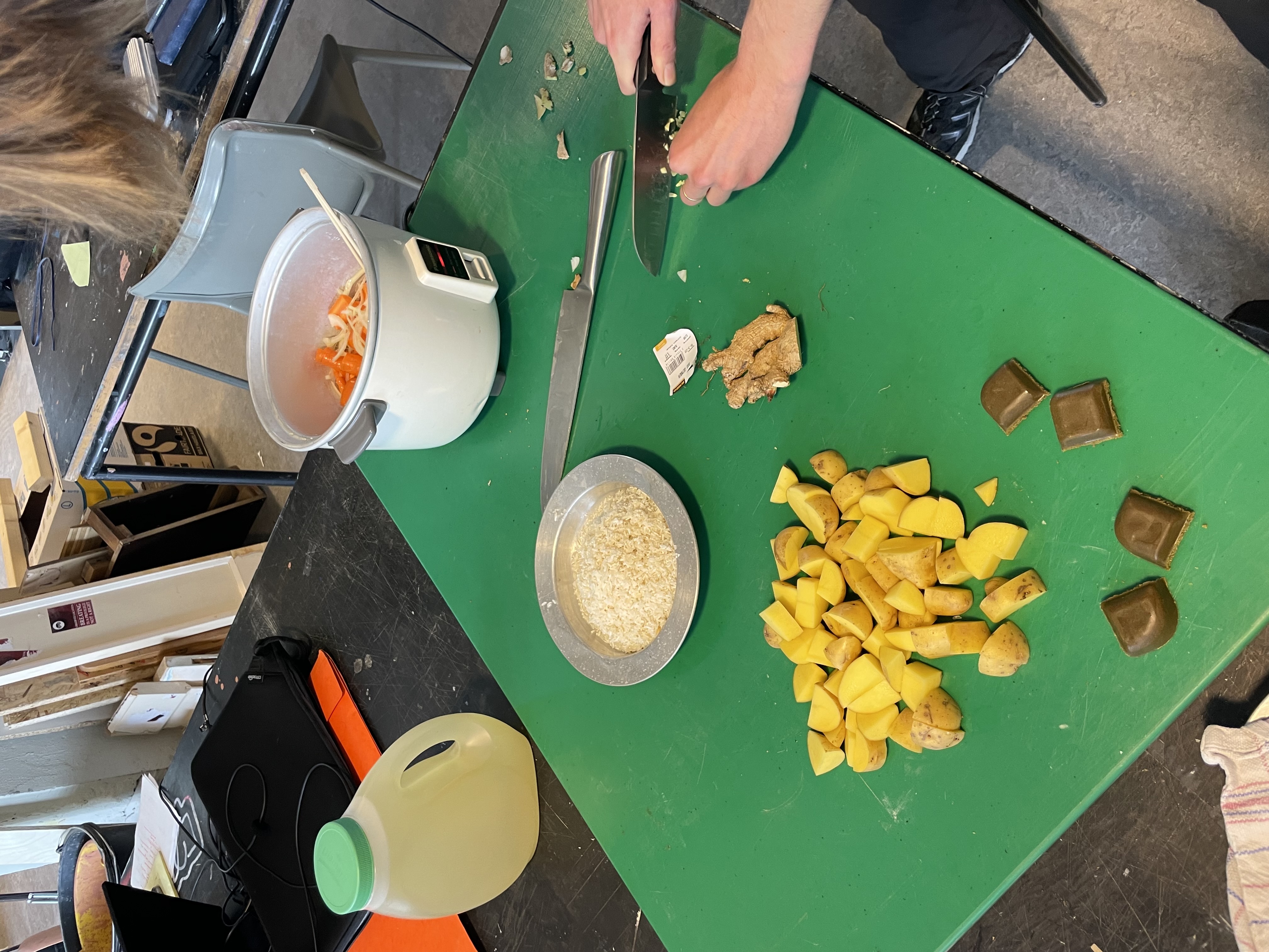 a cutlery set hanger hanged in a person hand